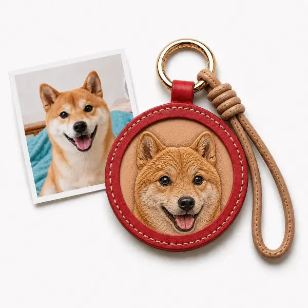 Handmade personalized dog portrait key ring displaying a premium carved leather tag with a custom Shiba Inu replica charm, unique luxury embossed animal memorial gift for pet lovers.