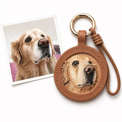 Custom dog photo to leather jewelry comparison, showing a real Golden Retriever dog photo transformed into a hand-tooled 3D leather carved portrait on a round tan keyring.