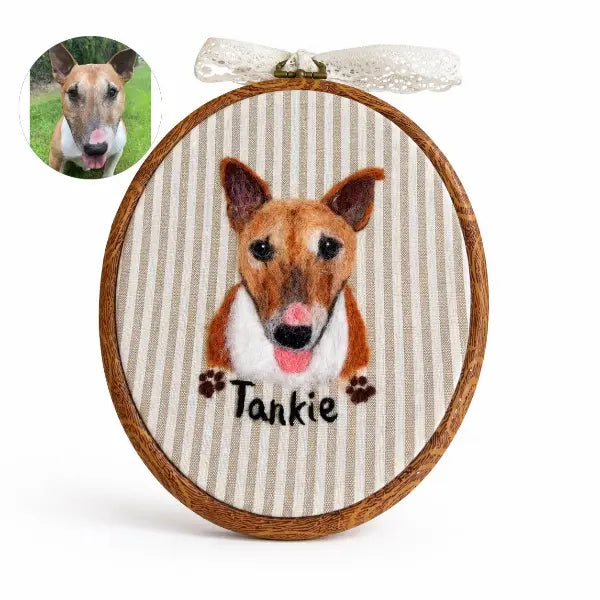 Custom pet photo to felt artwork comparison, showing a circular Bull Terrier dog photo transformed into a handmade 3D needle-felted portrait in a wooden oval embroidery hoop.