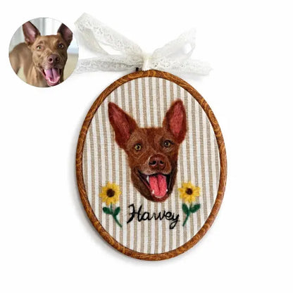 Custom dog photo to felt artwork comparison, showing a circular brown dog with big erect ears photo transformed into a handmade 3D needle-felted portrait in a wooden oval embroidery hoop.