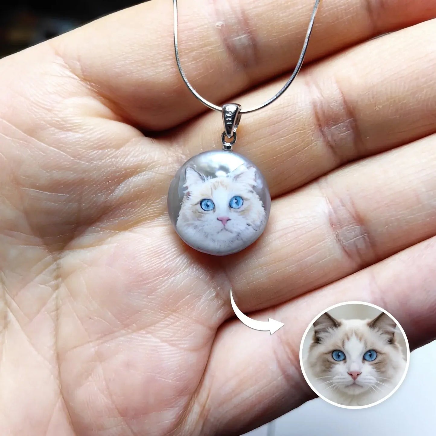 Hand-painted Ragdoll cat portrait on a freshwater pearl pendant, showing a comparison with the real pet photo by Muse & Paw.